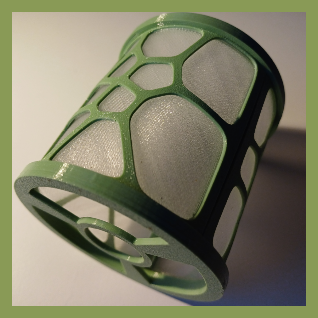 Bottom view of a Voronoi diagram based shade of a wall lamp used for lighting.