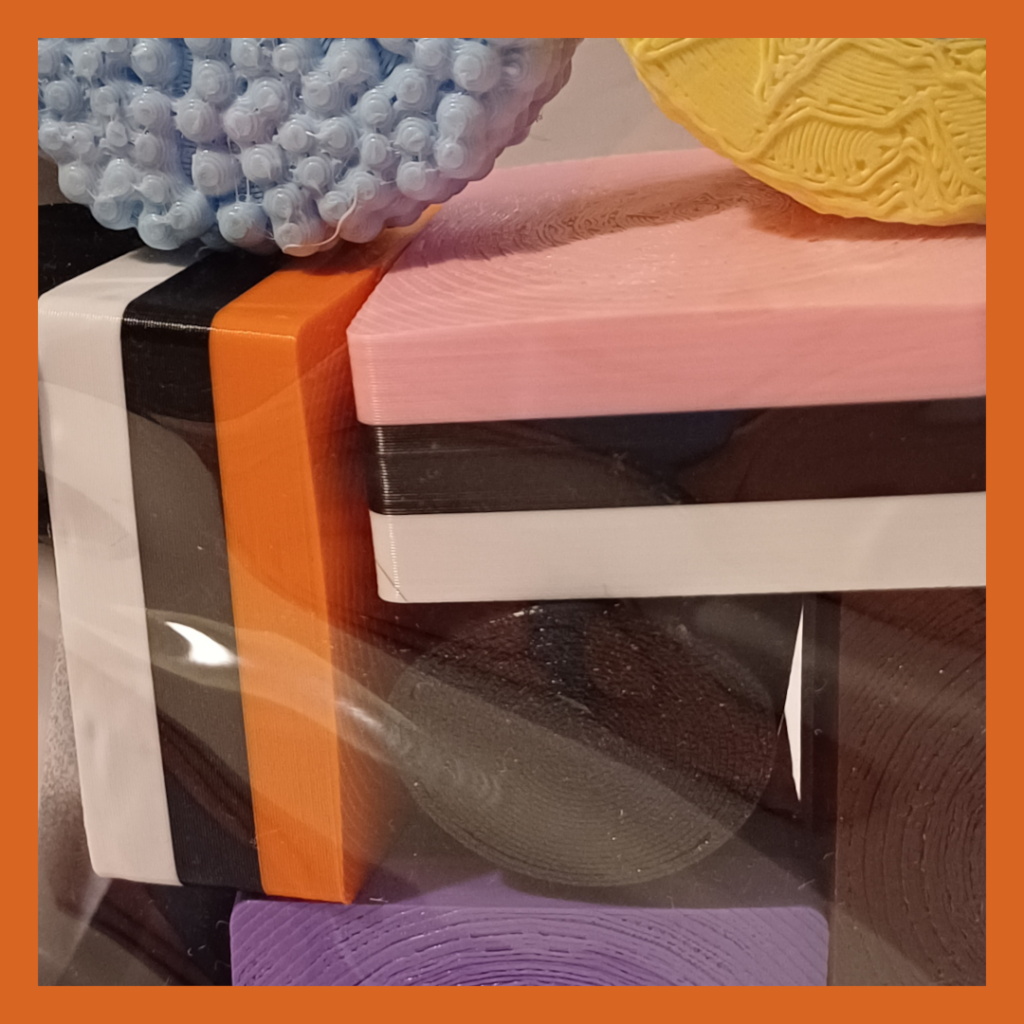 Front view details of double sized liquorice allsorts in a transparent bag used for decoration.