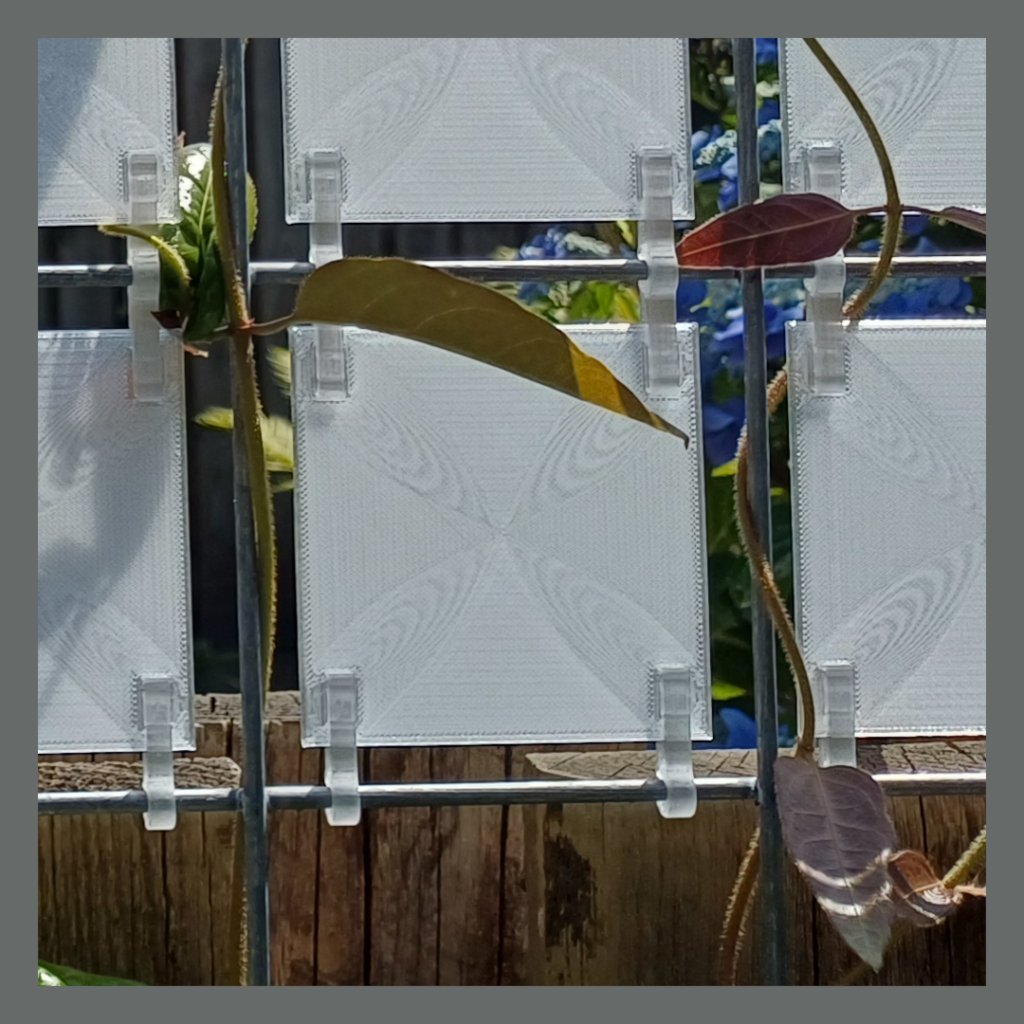 Front view details of a flexible mesh panel inlay used for enhanced privacy.
